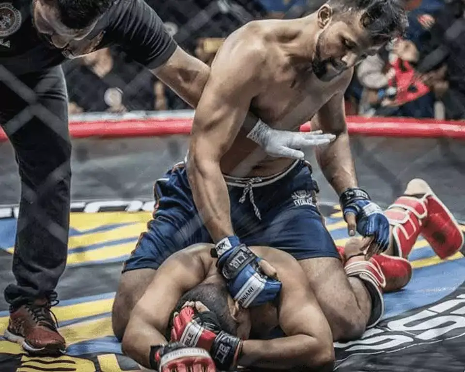 Muhammed Sanoob, founder and head coach of SanoobFit, 2x National MMA Champion